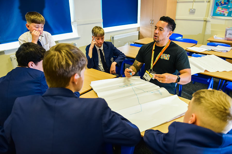 Marvin works at a school mentoring young people