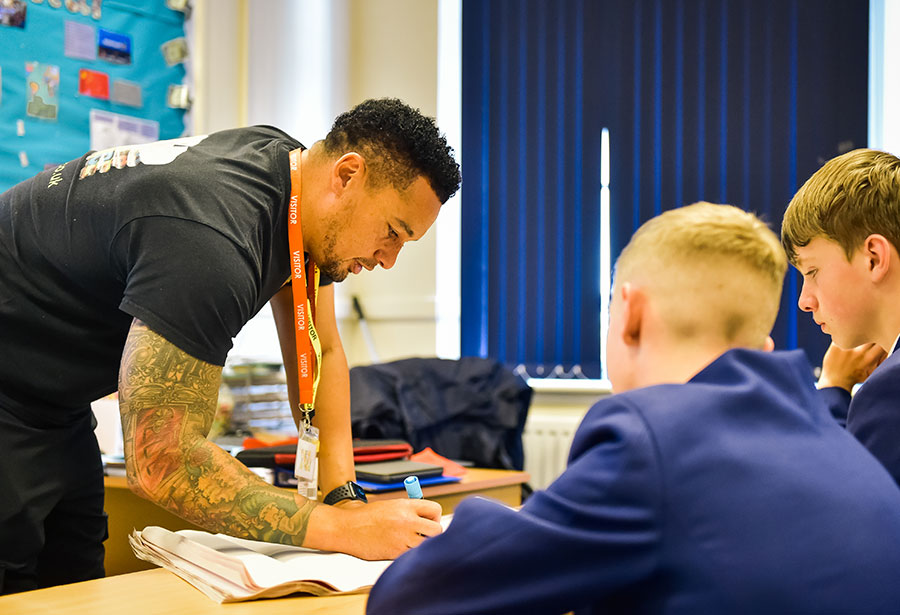 Marvin works at a school mentoring young people